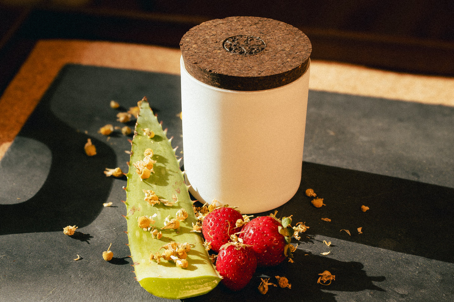 natural beeswax candle in glass jar and cork lid