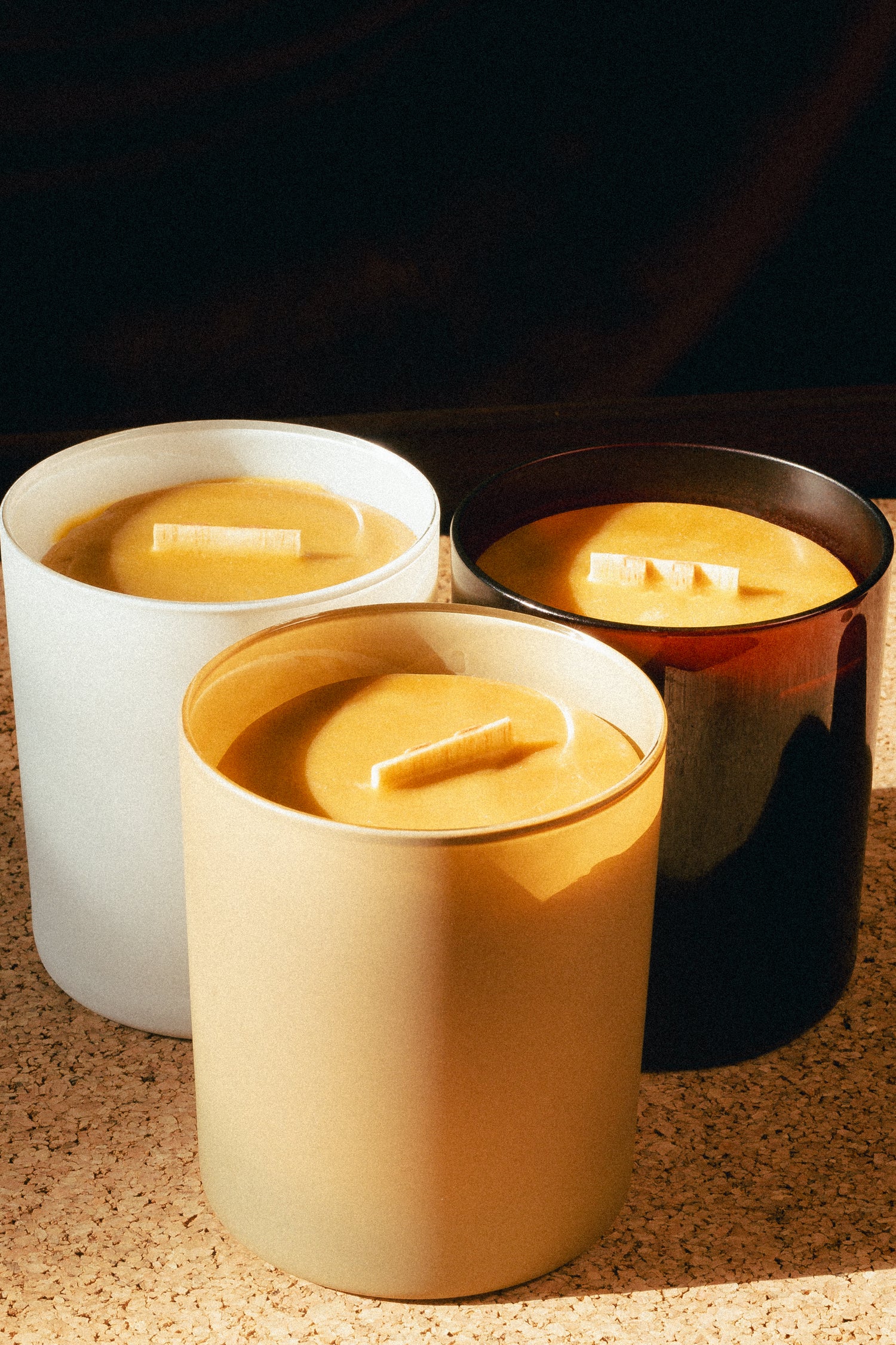 3 natural beeswax candles in glass jars